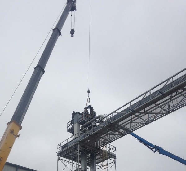 Removing bucket elevator belt and buckets with a crane