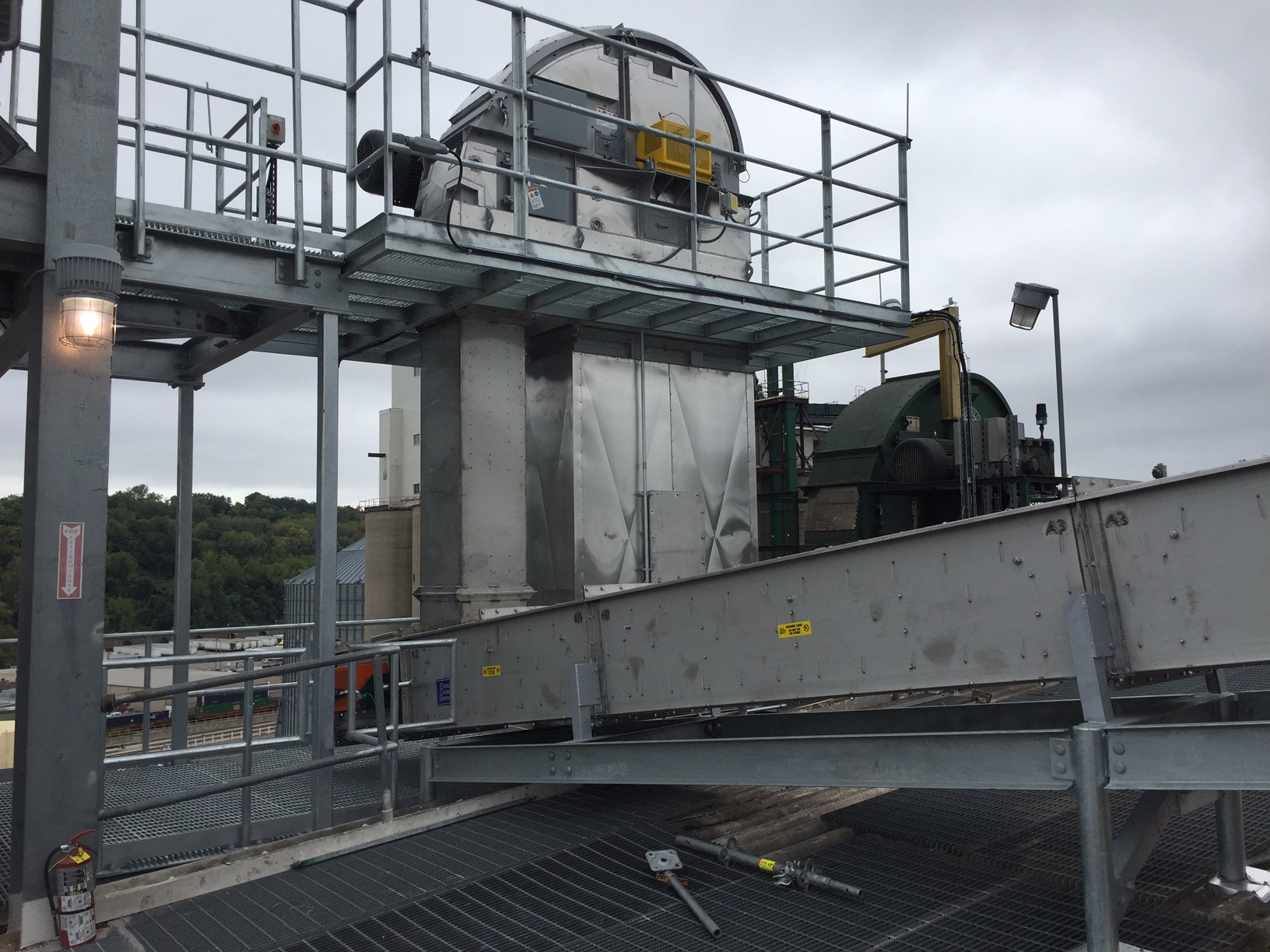 Bucket Elevator Spouting to a Conveyor